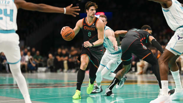Washington Wizards forward Deni Avdija (8) looks to pass during the artist half against the Charlotte Hornets at Capital One Arena.